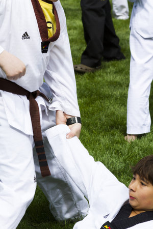 Tae Kwon Do student practicing in the park.のeditorial素材