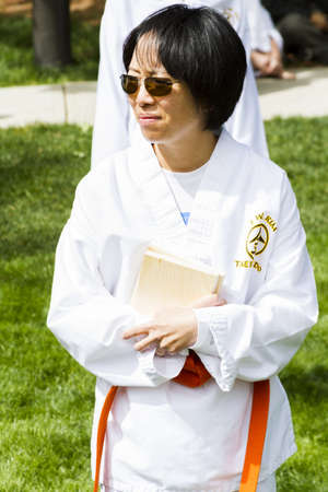 Tae Kwon Do student practicing in the park.のeditorial素材