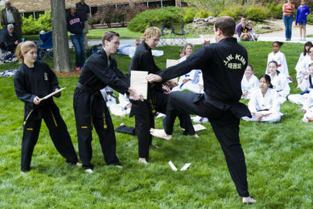 Tae Kwon Do student practicing in the park.のeditorial素材