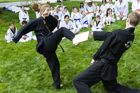 Tae Kwon Do student practicing in the park.のeditorial素材