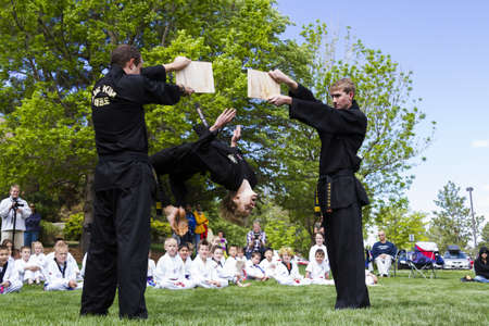 Tae Kwon Do student practicing in the park.のeditorial素材