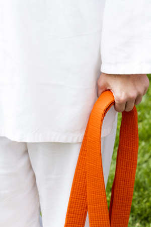 Tae Kwon Do student practicing in the park.のeditorial素材