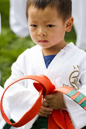 Tae Kwon Do student practicing in the park.のeditorial素材