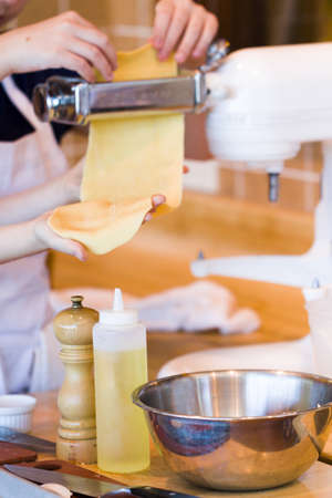 Learning how to make fresh spaghetti from scratch.の写真素材