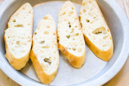 Kinds in cooking class making bruschetta.の写真素材