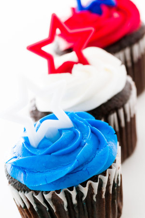 Patriotic holiday cupcakes decorated with stars.の写真素材