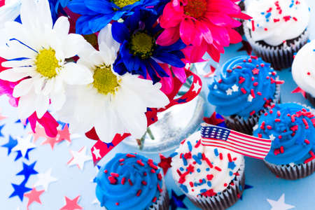 Patriotic holiday cupcakes decorated for july 4th.の写真素材