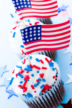Patriotic holiday cupcakes decorated for july 4th.の写真素材