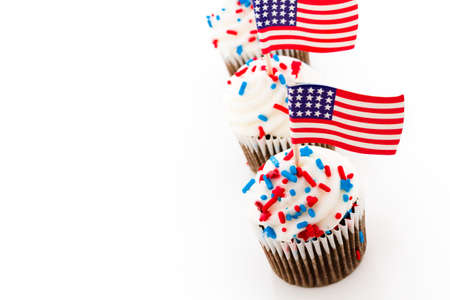 Patriotic holiday cupcakes decorated for july 4th.の写真素材