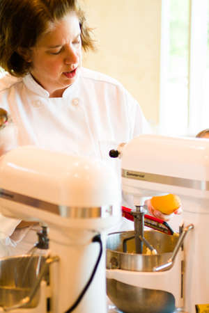 Kinds in cooking class learning how to cook and bake.のeditorial素材