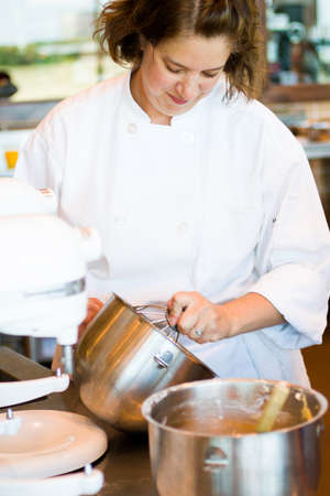 Kinds in cooking class learning how to cook and bake.のeditorial素材