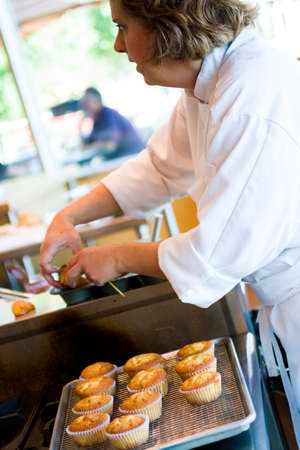 Kinds in cooking class learning how to cook and bake.のeditorial素材