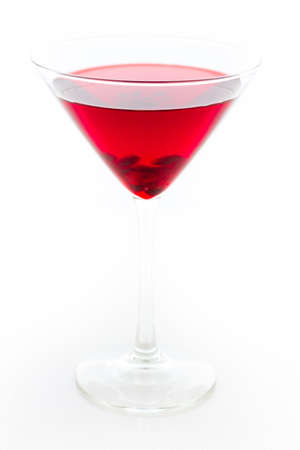 Pomegranate cosmo cocktail with lemon as a garnish.の写真素材