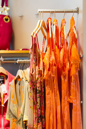 Designer clothing on display at the womens store.の写真素材