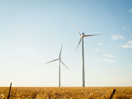 Wind turbines farm at sunset in Limon, Colorado.の写真素材