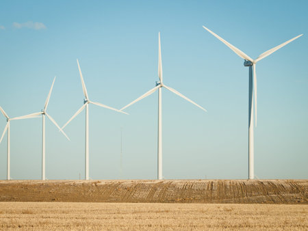 Wind turbines farm at sunset in Limon, Colorado.