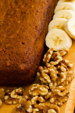 Freshly baked classic banana bread with walnuts and bananas.