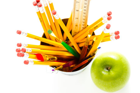 Variety of school supplies on a white background.