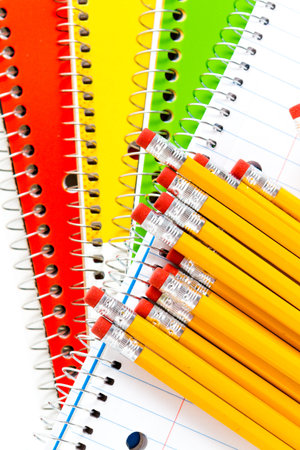 Variety of school supplies on a white background.