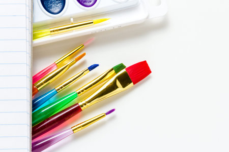 Variety of school supplies on a white background.