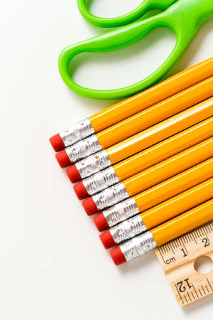 Variety of school supplies on a white background.の写真素材