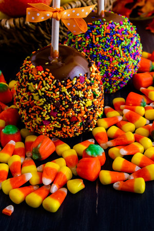 Hand dipped caramel apple covered with multi color sprinkles.