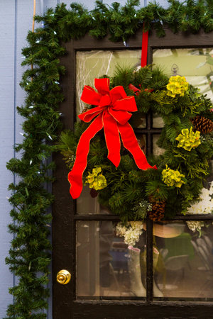 House decorated with evergreens for Christmas.の写真素材