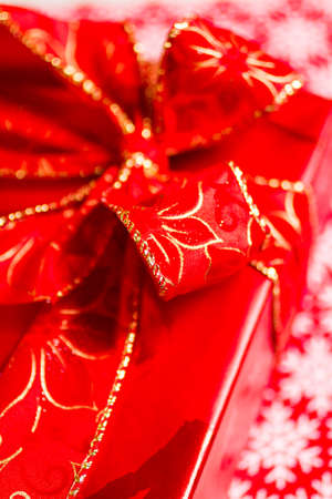 Christmas presents wrapped in red paper.の写真素材