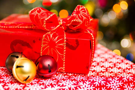 Christmas presents wrapped in red paper.の写真素材