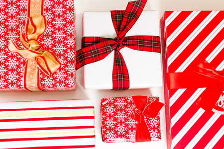 Christmas presents wrapped in colorful paper.の写真素材