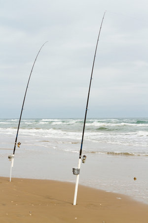 Beach fishing on South Padre Island.の写真素材