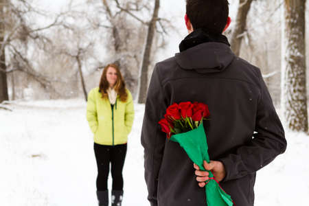 Teenager boy with Valentines Day gifts for his girlfriend.の写真素材