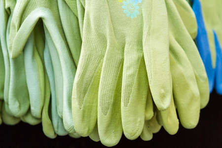 Garden gloves on display at the nursery.の写真素材