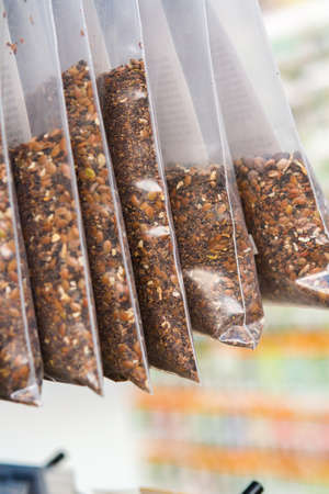 Wild flower seeds in plastic bags for sale.の写真素材