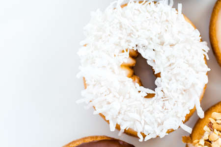 Variery of fresh donuts on a white background.の写真素材