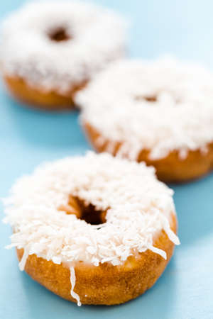Fresh cake donuts with cocunut topping from the local bakery shop.の写真素材