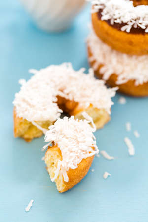 Fresh cake donuts with cocunut topping from the local bakery shop.の写真素材