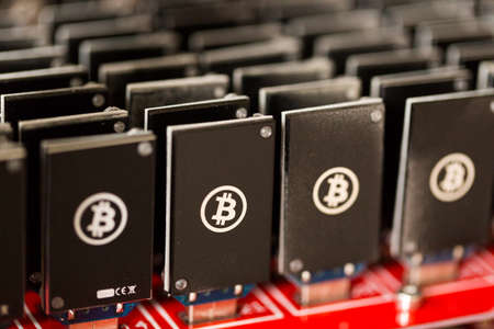 Bitcoin mining USB devices on a large USB hub.の写真素材
