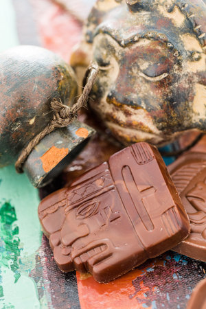 Gourmet Maya glyphs in milk chocolate.