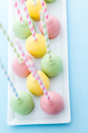 Easter cake pops on fancy fun straws.