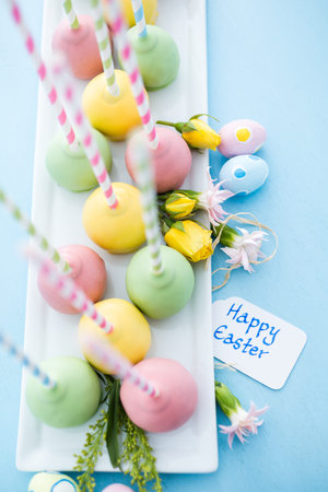 Easter cake pops on fancy fun straws.