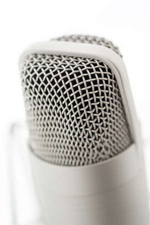 Studio microphone for recording podcasts on a white background.の写真素材