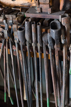 Tools of the blacksmith in blacksmith shop.の写真素材