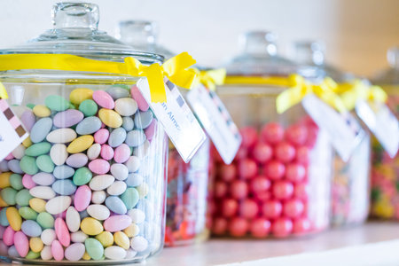Jars filled with different candies at the boutique candy store.