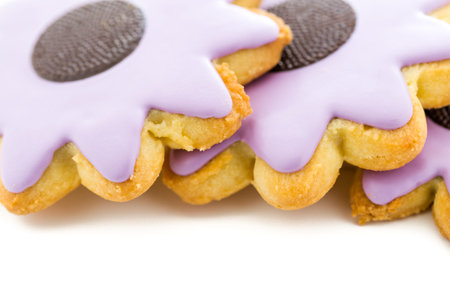 Easter sugar cookies in shape of flower with chocolate icing.