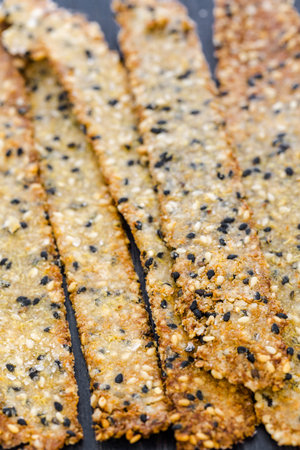 Gluten free crackers with seeds and quinoa flakes.