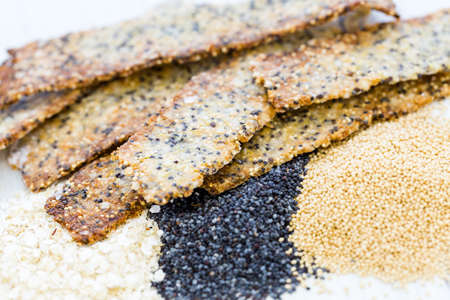 Gluten free crackers with seeds and quinoa flakes.の写真素材