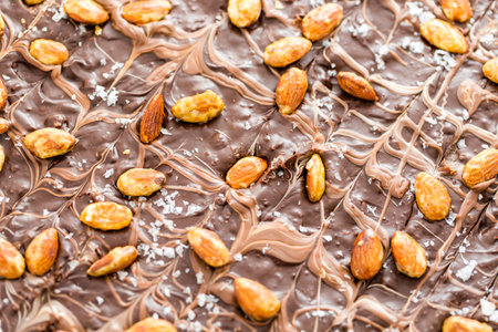 Gourmet slab of Almond Bark on a white background.