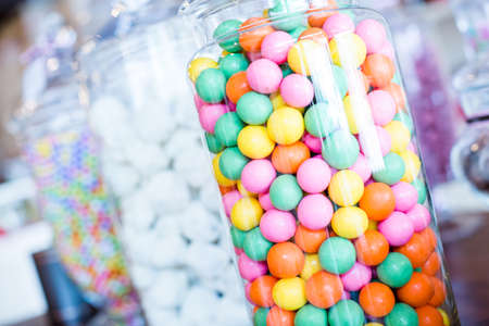 Multicolored candies on display at the candy store.の写真素材