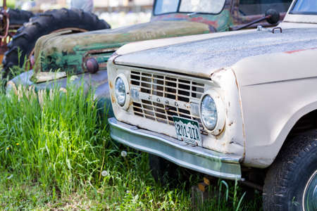 Boulder, Colorado, USA-June 1, 2014. Vintage Ford trucks on old farm.のeditorial素材